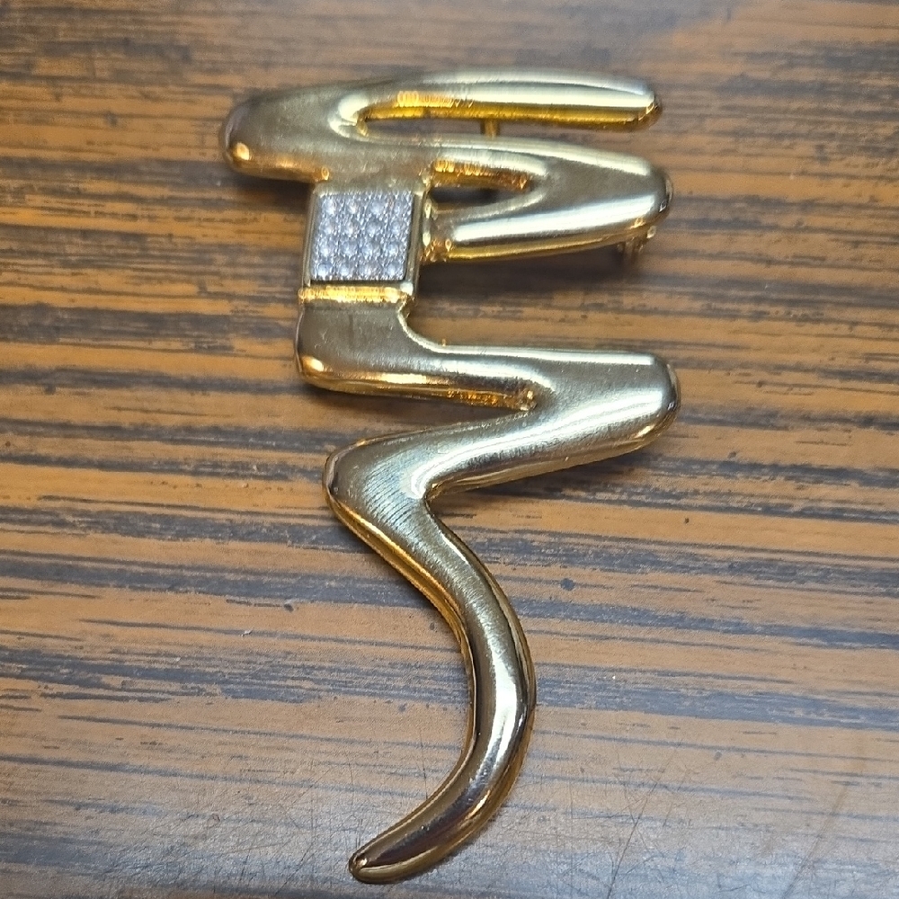 Gold Brooch with Rhinestone Accent